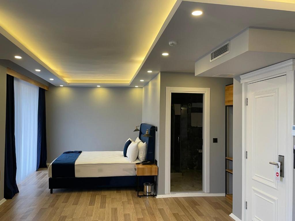 Postel nebo postele na pokoji v ubytování Union Hotel Karaköy