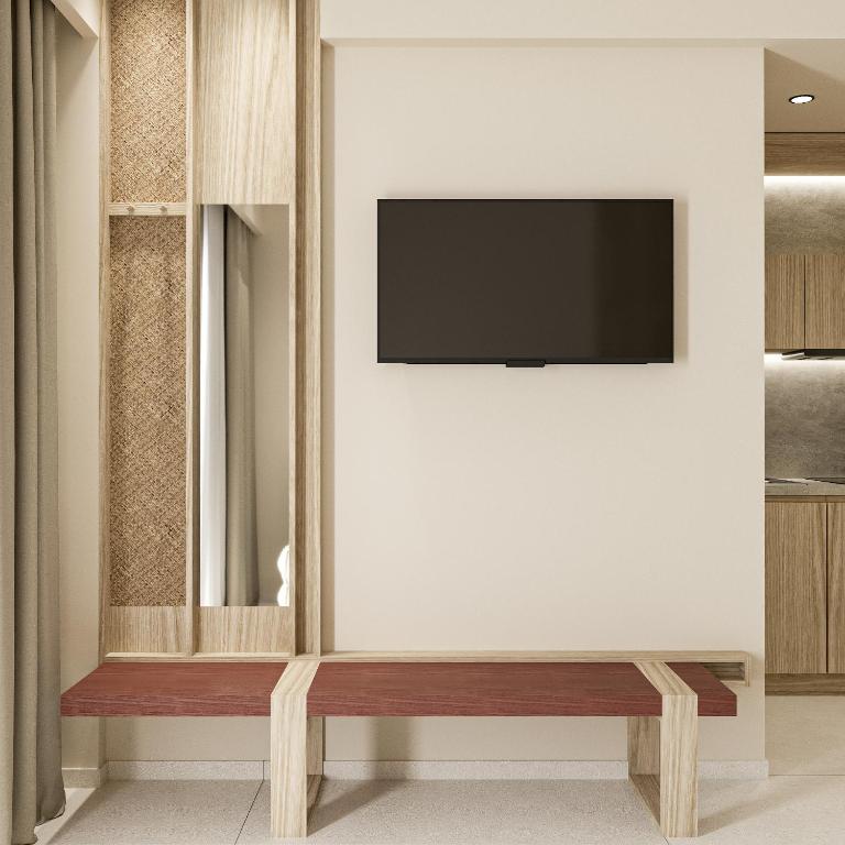 Telewizja i/lub zestaw kina domowego w obiekcie Falassarna Beach studios&apartments