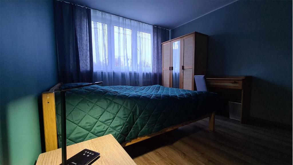 Posteľ alebo postele v izbe v ubytovaní Spokojny Wypoczynek 4