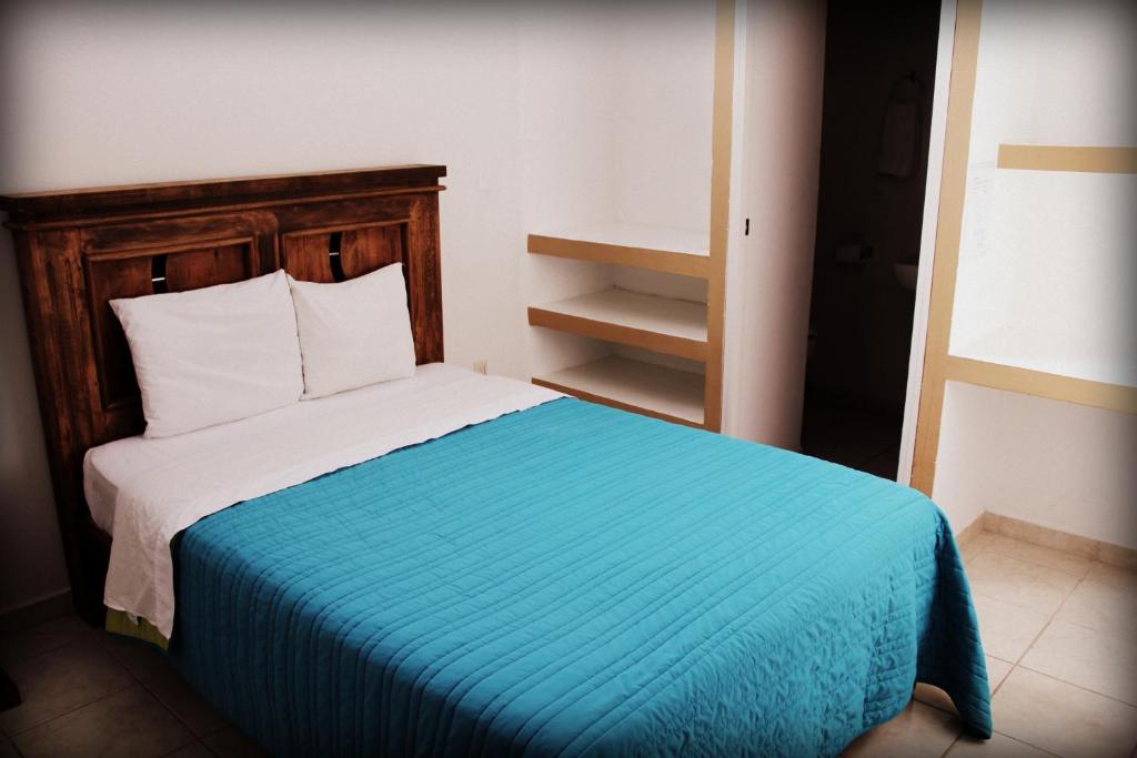 Postel nebo postele na pokoji v ubytování Residencia San Pablo