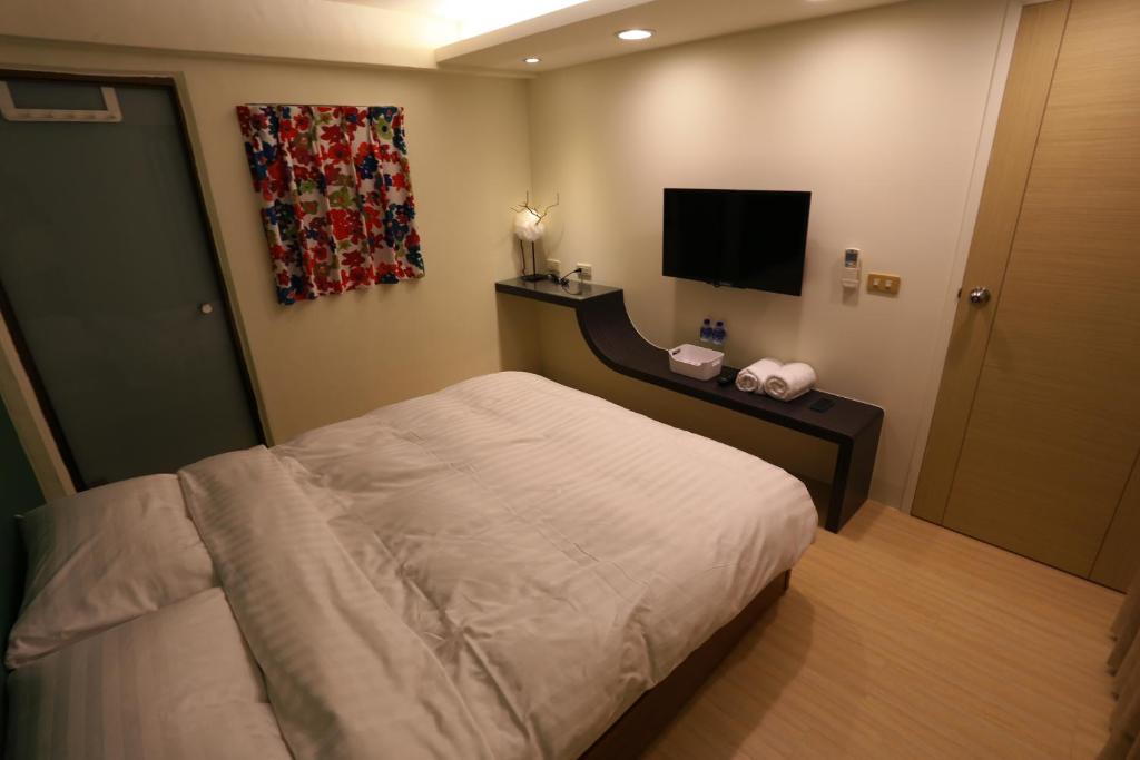TV a/nebo společenská místnost v ubytování Mu Ju B&B