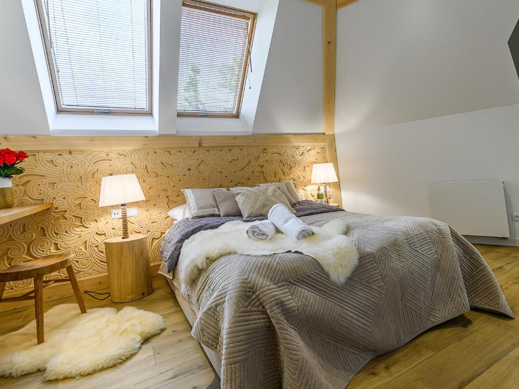 Posteľ alebo postele v izbe v ubytovaní VisitZakopane - Palermo Apartment