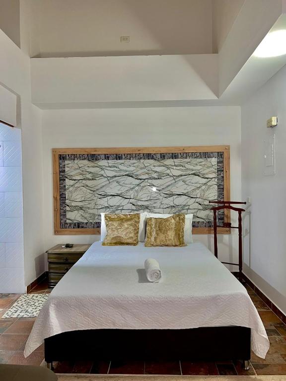 Postel nebo postele na pokoji v ubytování Hotel Torre Primavera