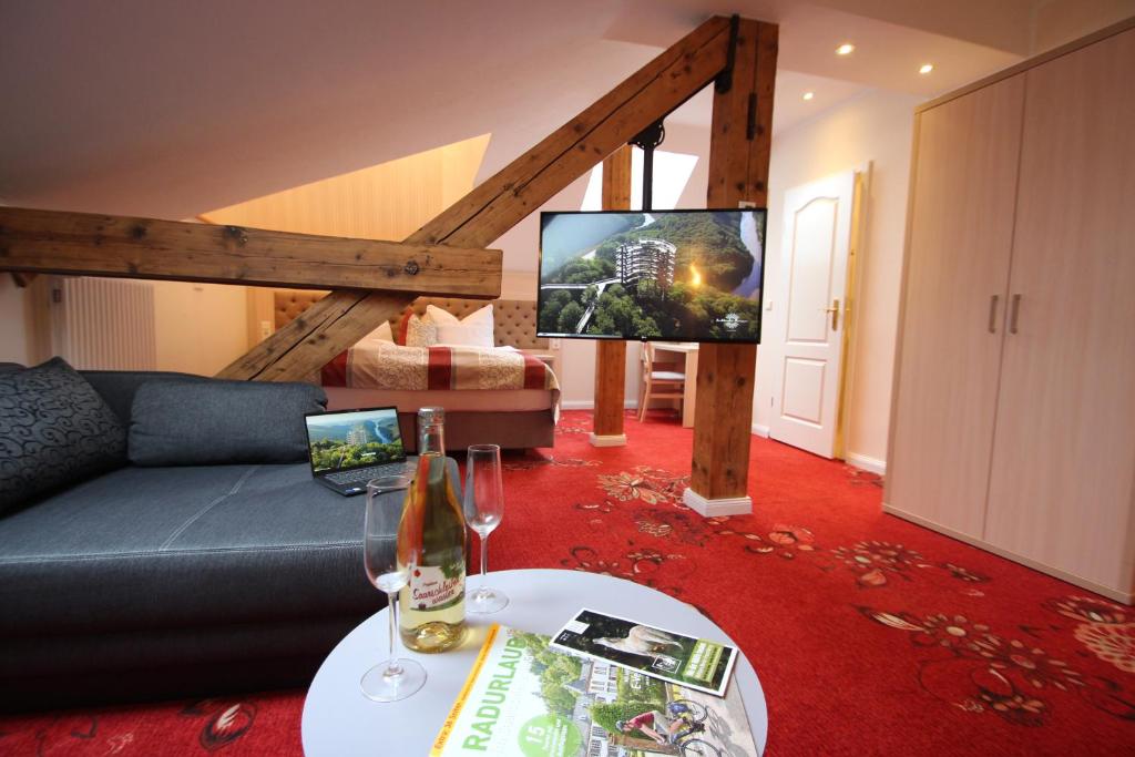 Posezení v ubytování Hotel Stadtvilla Laux