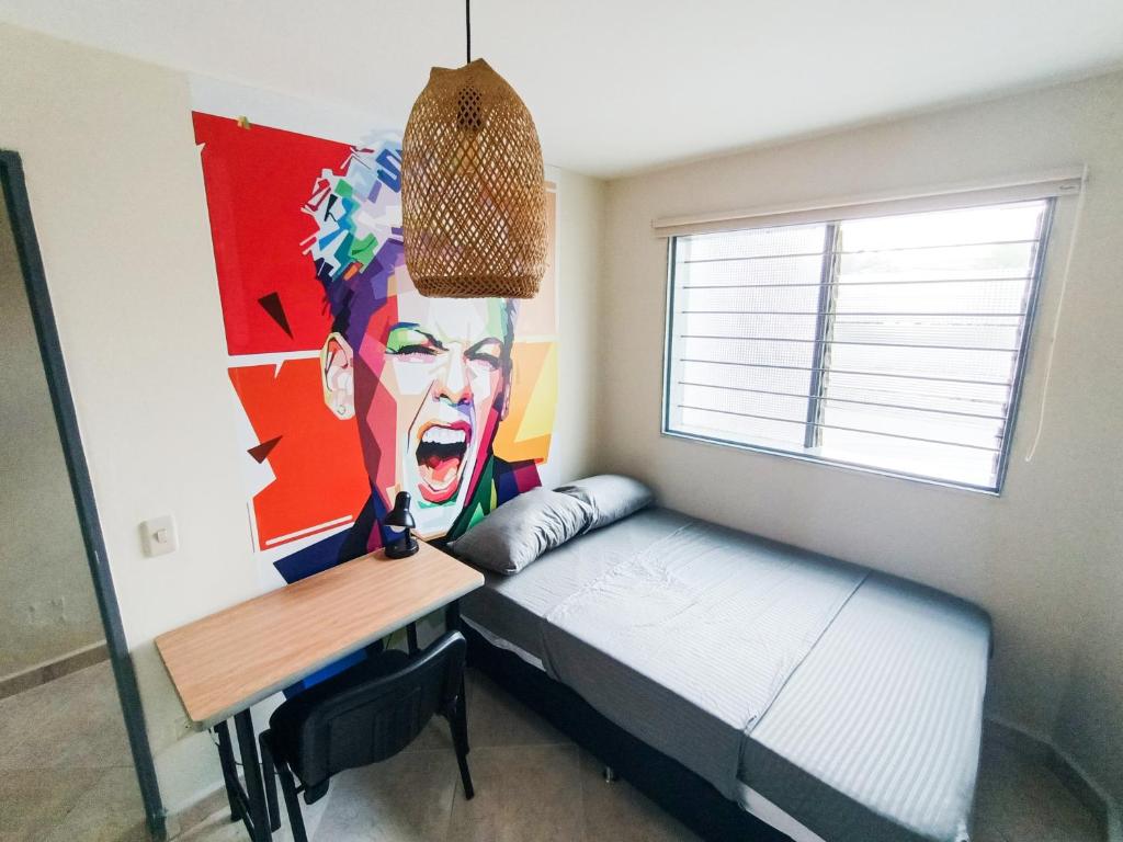 Postel nebo postele na pokoji v ubytování Casa Clandestina Guest House