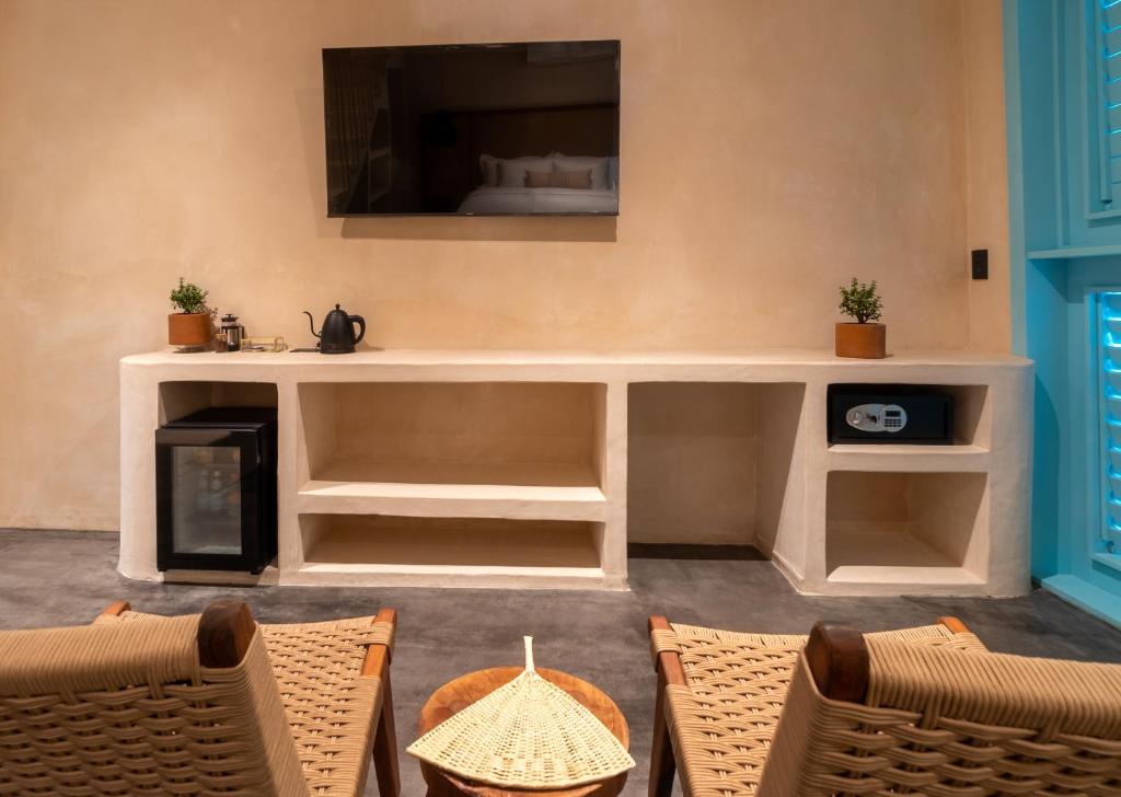 TV a/nebo společenská místnost v ubytování Bacalari - Adults Only