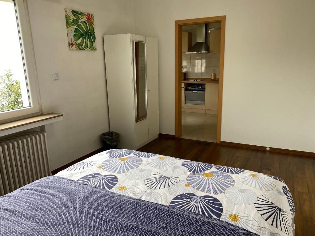 Postel nebo postele na pokoji v ubytování Apartment CHEZ TONY