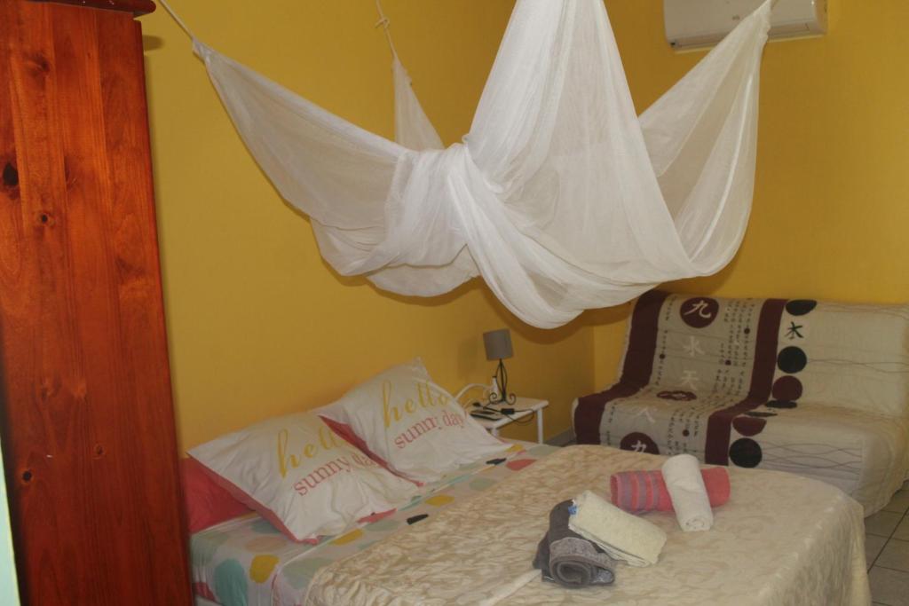 Postel nebo postele na pokoji v ubytování Gite bagatelle classé 2 étoiles