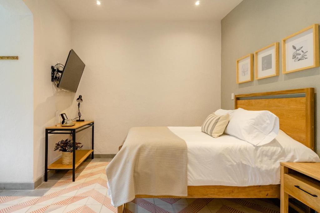 Postel nebo postele na pokoji v ubytování Casa Mateo
