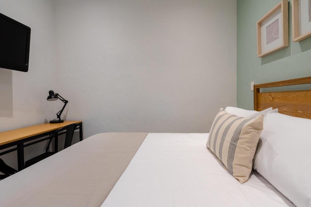 Postel nebo postele na pokoji v ubytování Casa Mateo