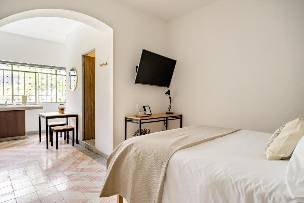 Postel nebo postele na pokoji v ubytování Casa Mateo
