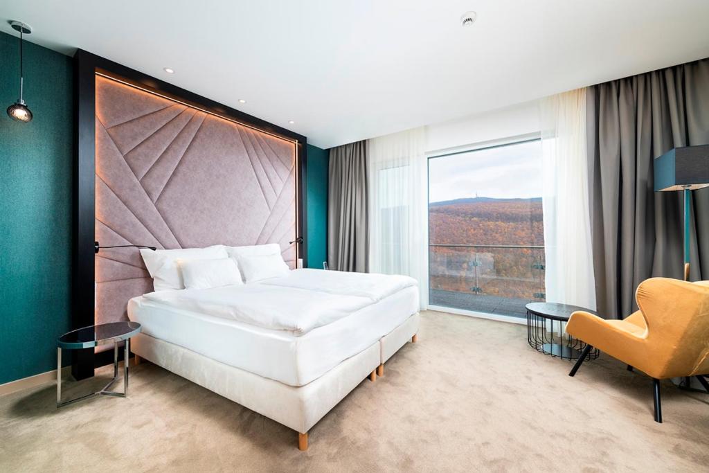 Łóżko lub łóżka w pokoju w obiekcie Hotel Ózon & Luxury Villas