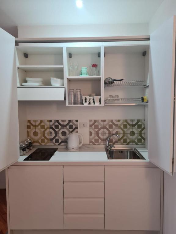 A kitchen or kitchenette at Casa D'Amato Salerno