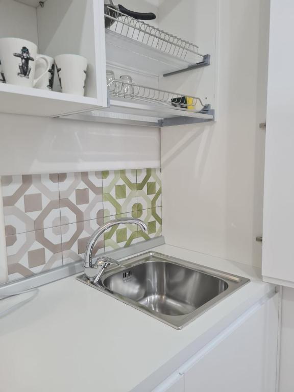 A kitchen or kitchenette at Casa D'Amato Salerno