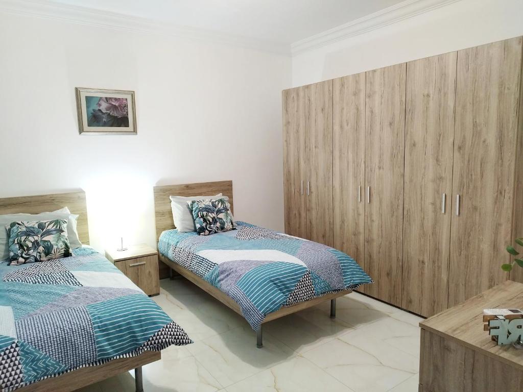 Postel nebo postele na pokoji v ubytování Large and modern apartment in the centre of Malta