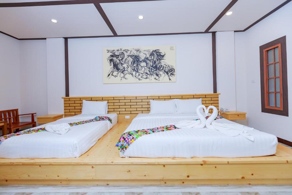Saline Hot Spring Resort นำ้พุร้อนเค็ม รีสอร์ท - Habitación Triple De Lujo