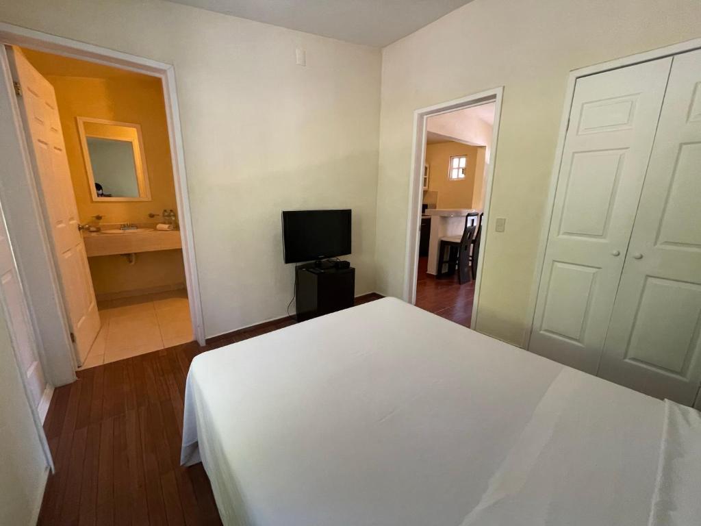 Postel nebo postele na pokoji v ubytování Hotel Real Home