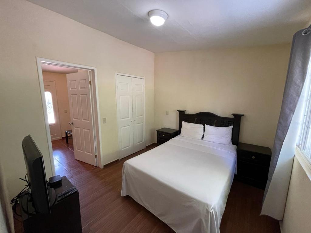 Postel nebo postele na pokoji v ubytování Hotel Real Home