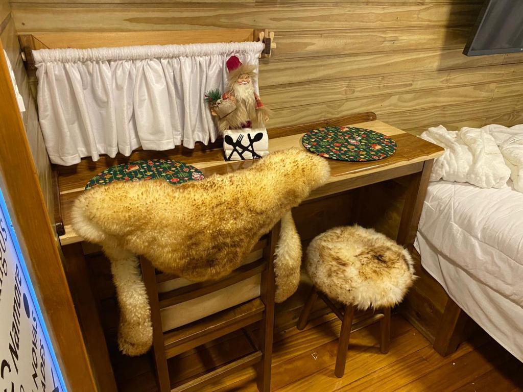 Postel nebo postele na pokoji v ubytování Chale Sobre Rodas e Spa Exclusive - Localizado Próximo do Centro