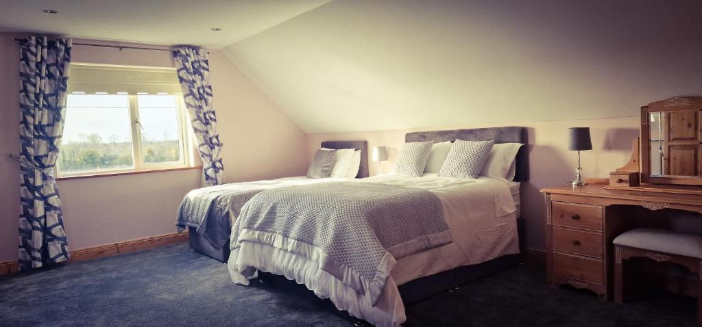 Postel nebo postele na pokoji v ubytování LittleField B&B Durrow, Laois