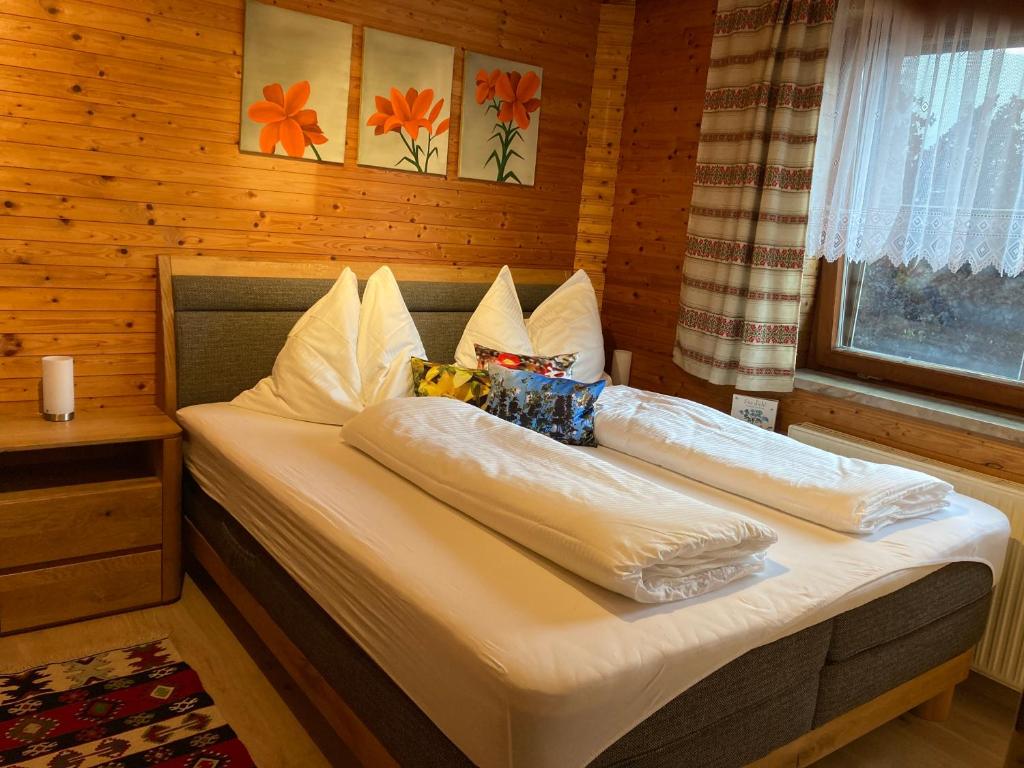 Postel nebo postele na pokoji v ubytování Haus Brugger