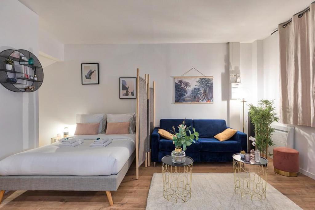 Posteľ alebo postele v izbe v ubytovaní Grand Studio au Cœur de Paris quartier Latin