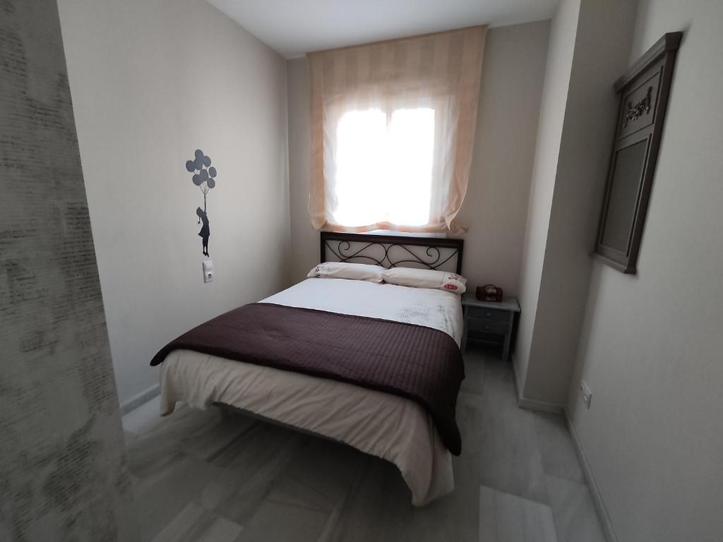 Posteľ alebo postele v izbe v ubytovaní Flamingo Sol Home