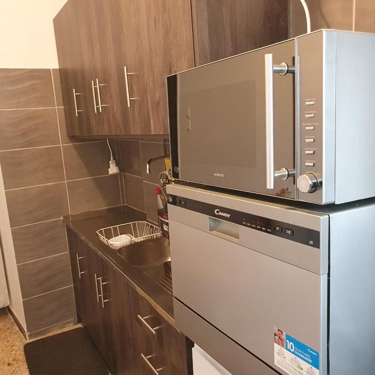 Kuchnia lub aneks kuchenny w obiekcie Success's Apartment
