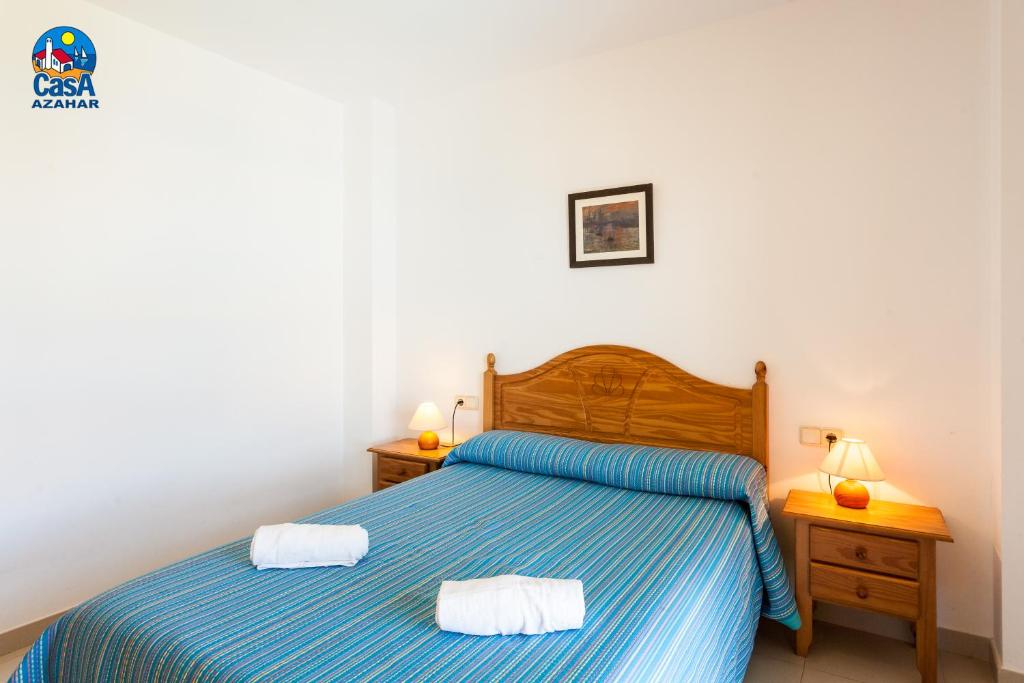 Postel nebo postele na pokoji v ubytování Apartamentos Bovalar Casa Azahar