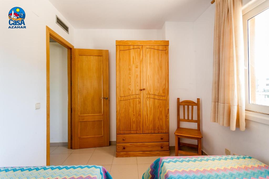 Postel nebo postele na pokoji v ubytování Apartamentos Bovalar Casa Azahar