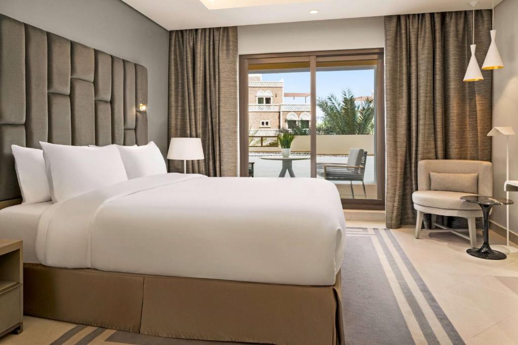 Postel nebo postele na pokoji v ubytování Wyndham Residences The Palm