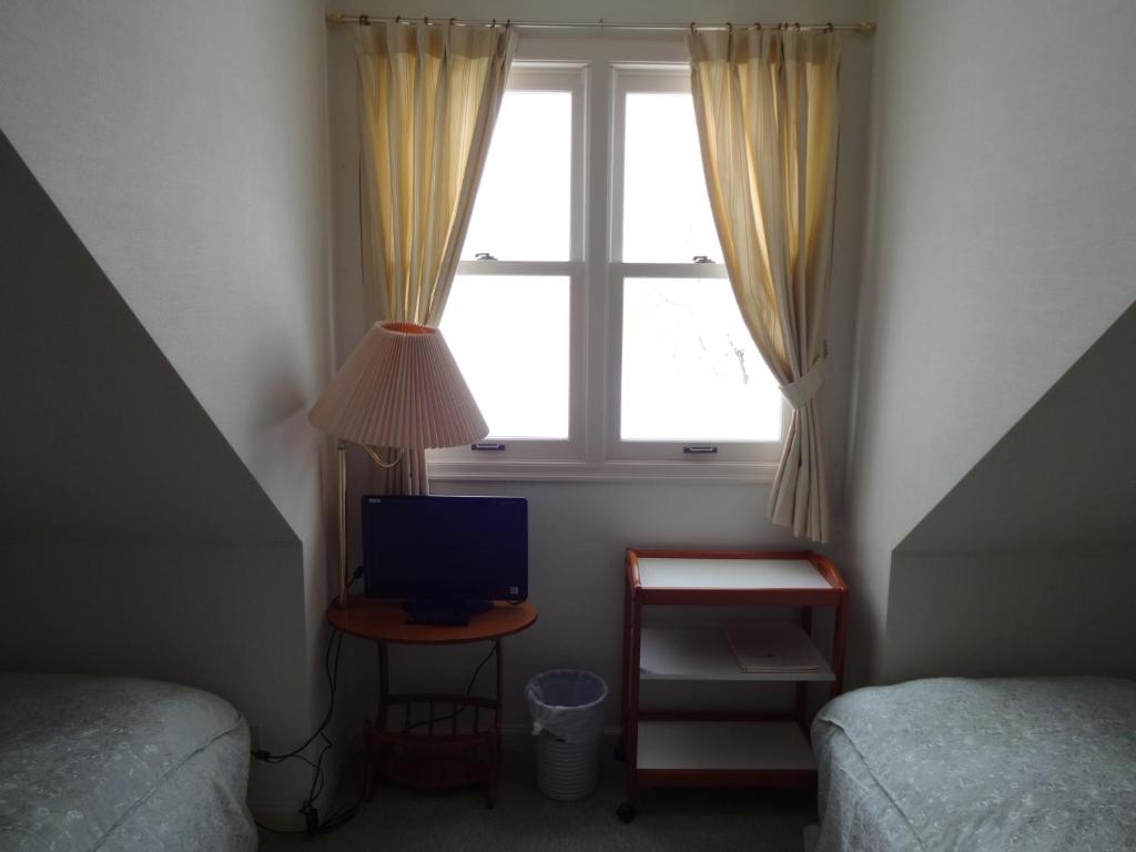 TV a/nebo společenská místnost v ubytování Guest House Bunk