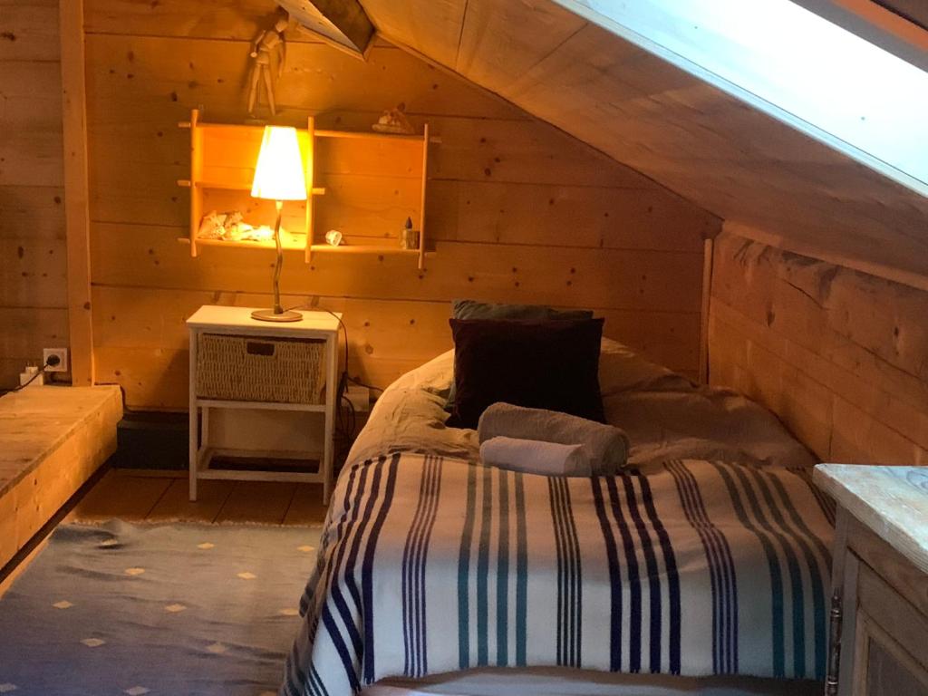 Postel nebo postele na pokoji v ubytování Le Solli