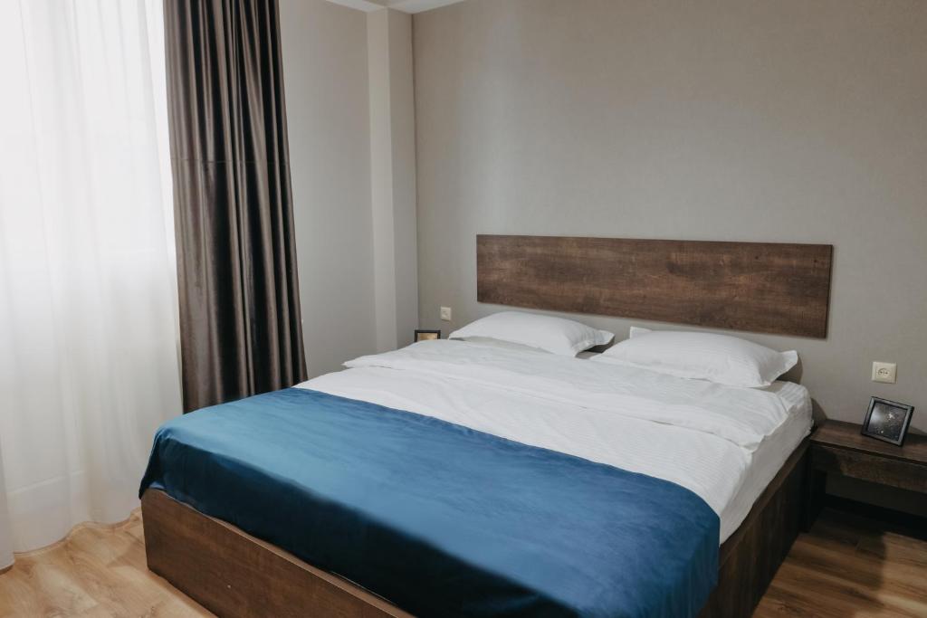 Postel nebo postele na pokoji v ubytování GABATA INN