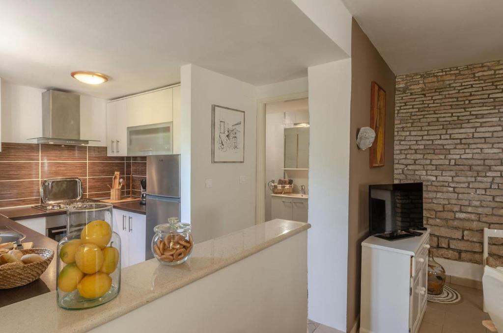 Kuchyň nebo kuchyňský kout v ubytování Holiday House Sanja Cafo