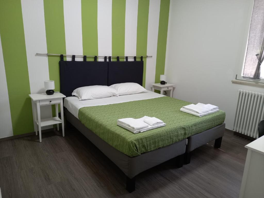 Un pat sau paturi într-o cameră la B&B KM 198 - Room&Breakfast