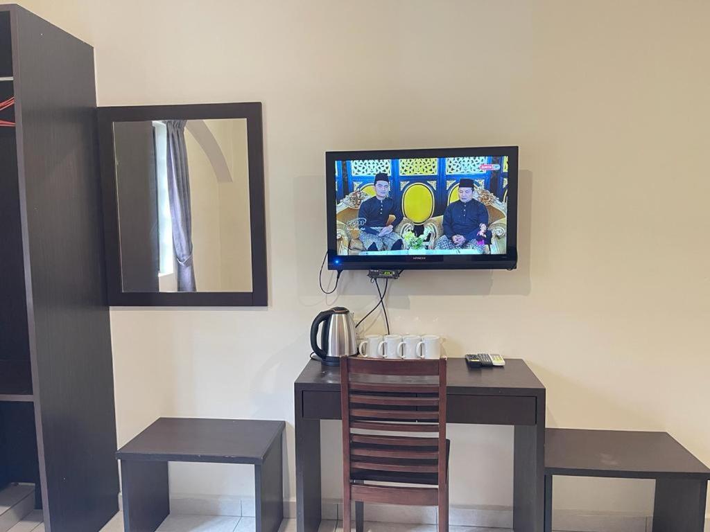 TV a/nebo společenská místnost v ubytování Ze Xiang Hotel - Desa Jaya Ikea Self Check in