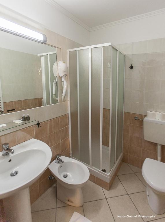 Koupelna v ubytování Hotel Bussana