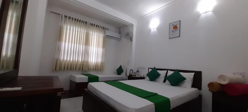 Postel nebo postele na pokoji v ubytování Senomaal Sigiri Resort