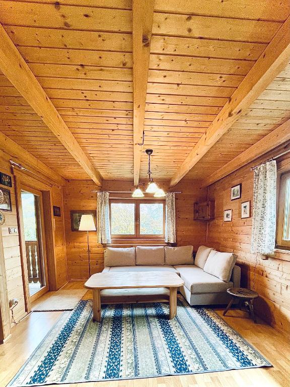 Postel nebo postele na pokoji v ubytování Blockhaus Semmering