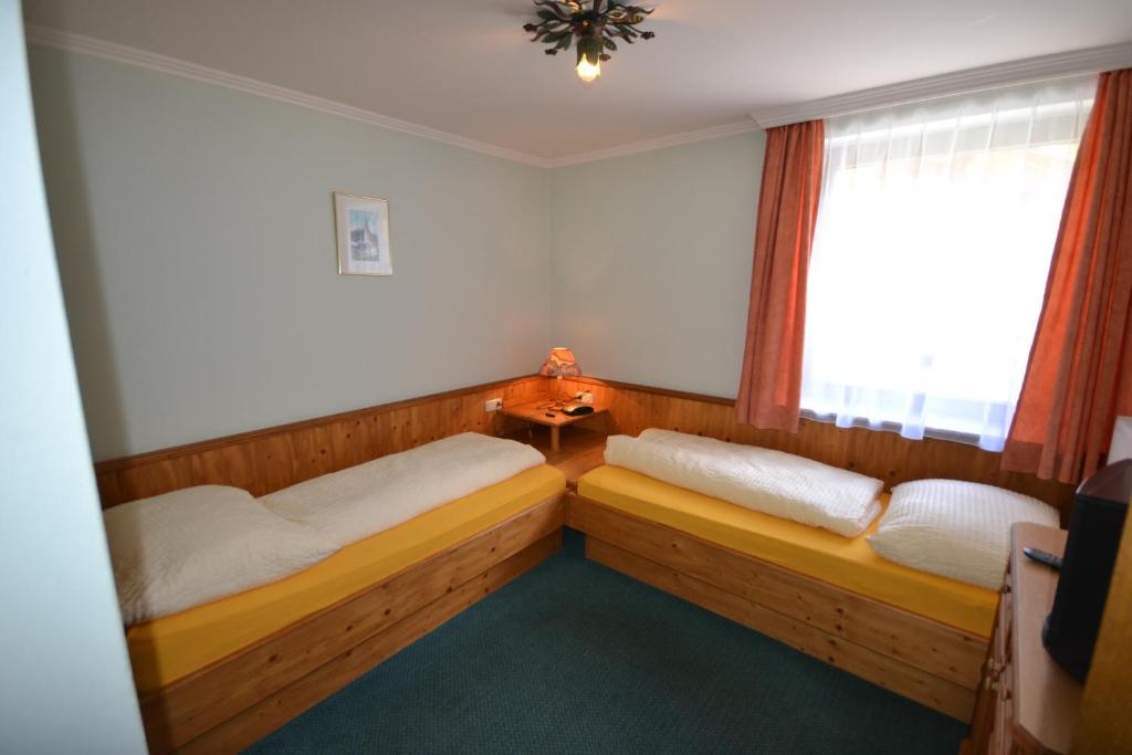 Postel nebo postele na pokoji v ubytování Appartementhaus Jägerheim