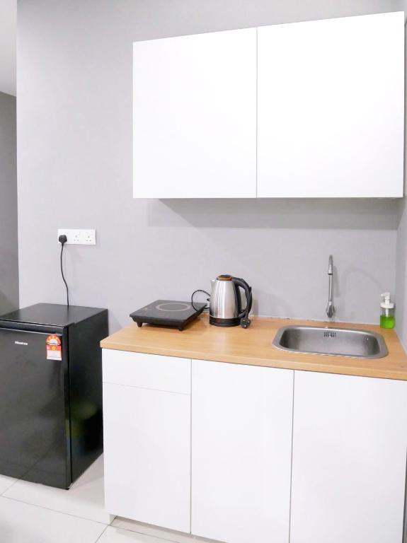 Kuchyň nebo kuchyňský kout v ubytování Atria Sofo Suites - Petaling Jaya