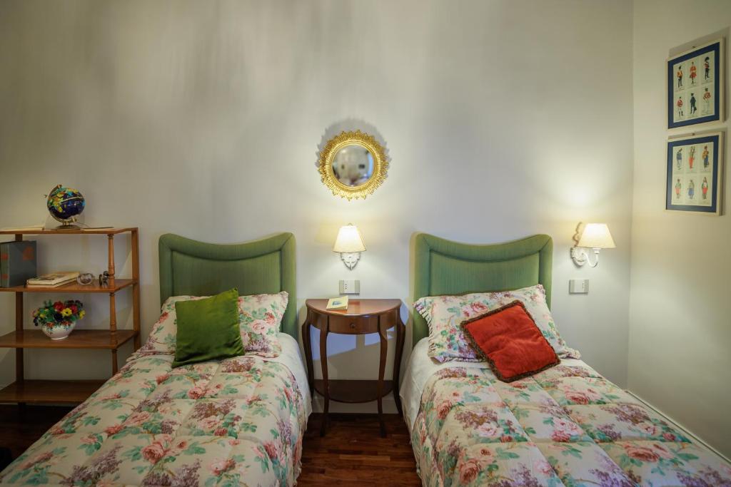 A bed or beds in a room at B&B CORSO VITTORIO
