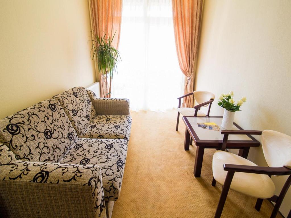 Posezení v ubytování Georg Palace Hotel