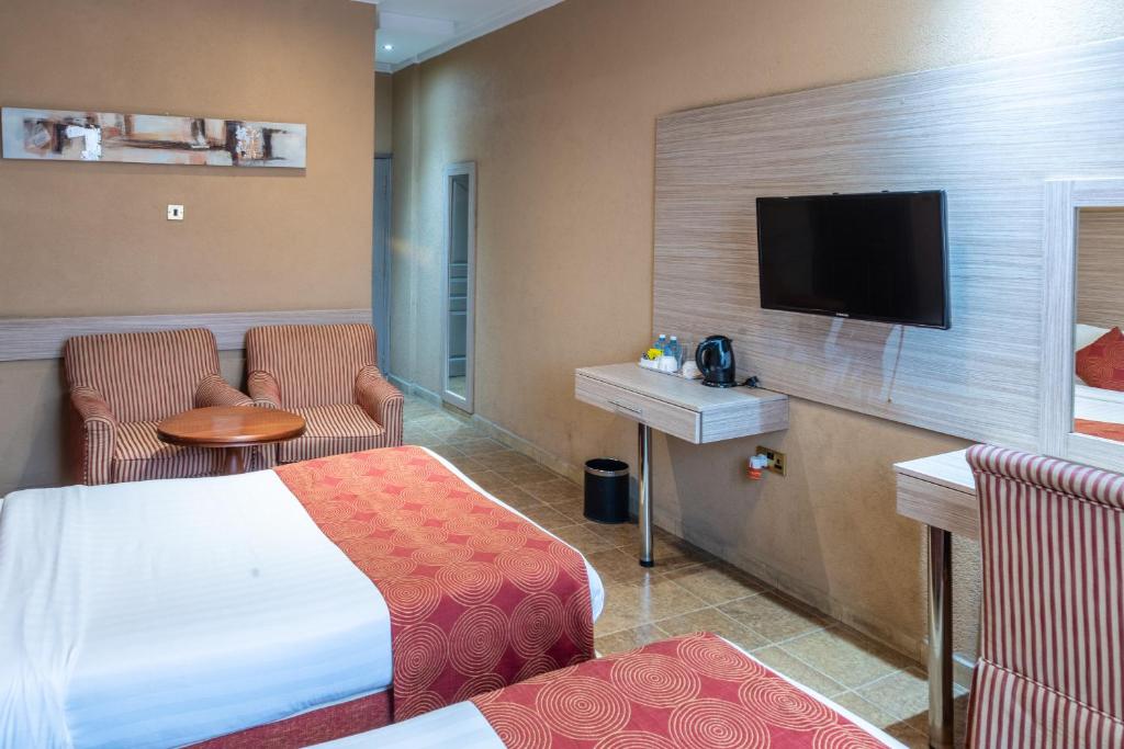 TV a/nebo společenská místnost v ubytování Hotel Waterbuck