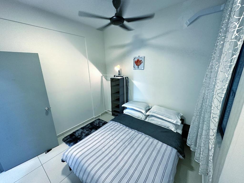 Postel nebo postele na pokoji v ubytování Adelea Homestay MERU