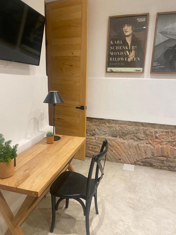 TV a/nebo společenská místnost v ubytování Hotel Atia