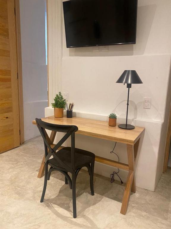 TV a/nebo společenská místnost v ubytování Hotel Atia