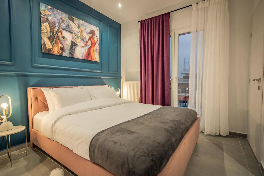 Posteľ alebo postele v izbe v ubytovaní Artemis Apartment Midas Home Project