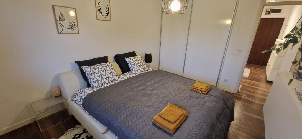 Łóżko lub łóżka w pokoju w obiekcie Apartman Franko- Jarun
